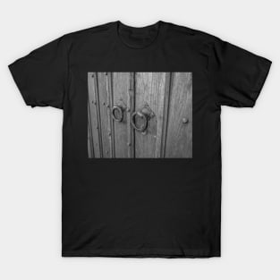 Traditional door knockers on wooden door T-Shirt